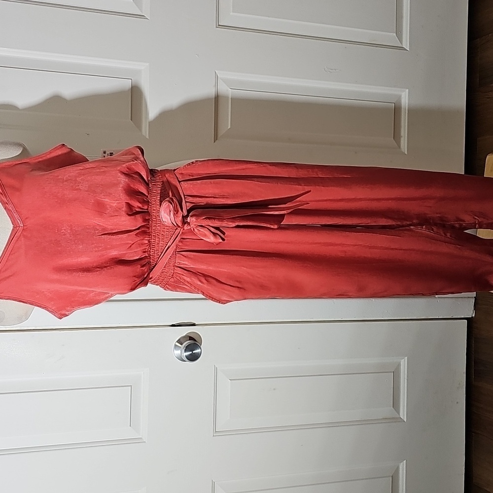 Women's jump suit. Beautiful skinny fabric‎ color is rouge. large. Elastic w tie